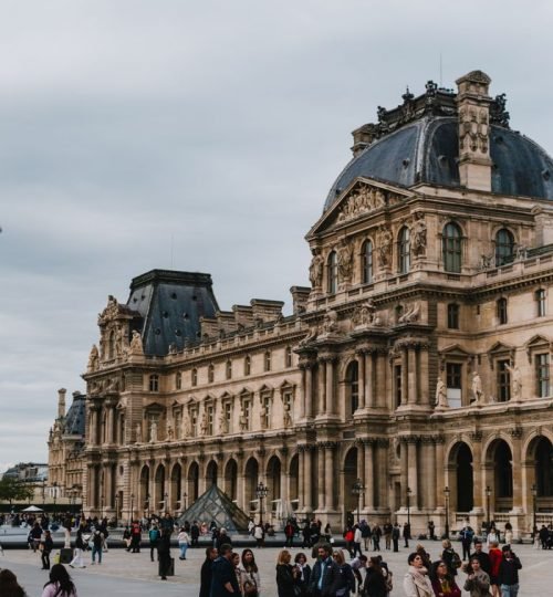 Explore the architectural grandeur of the Louvre Museum in Paris, France.